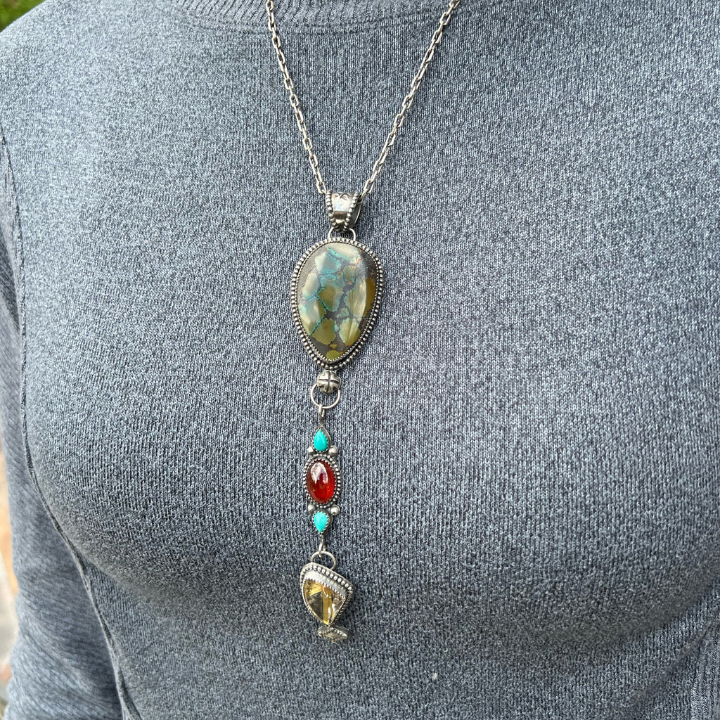 Polychrome Hubei Turquoise with Hessonite Garnet, Kingman Turquoise, & Golden Rutile in Quartz Triple Drop Silver Pendant