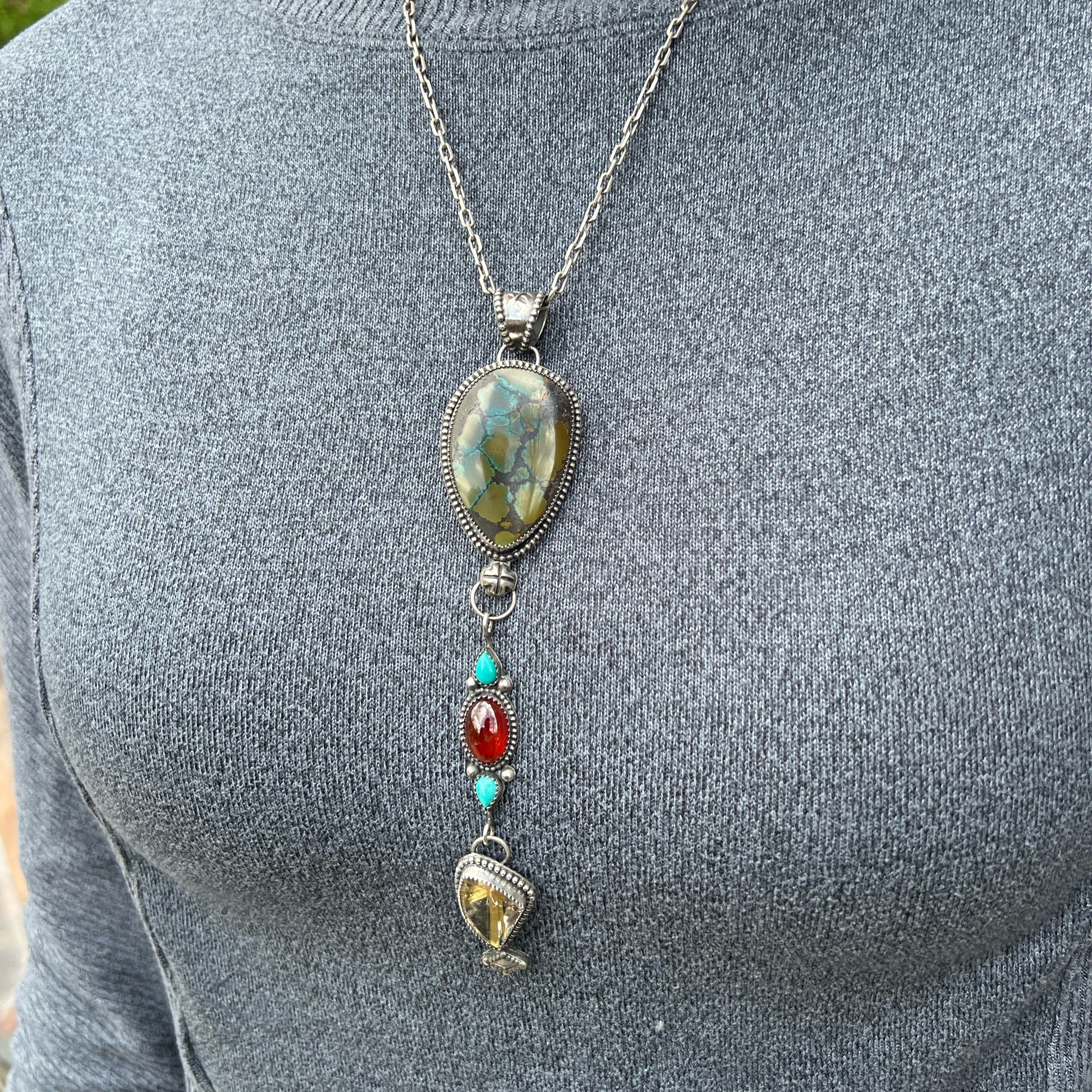 Polychrome Hubei Turquoise with Hessonite Garnet, Kingman Turquoise, & Golden Rutile in Quartz Triple Drop Silver Pendant