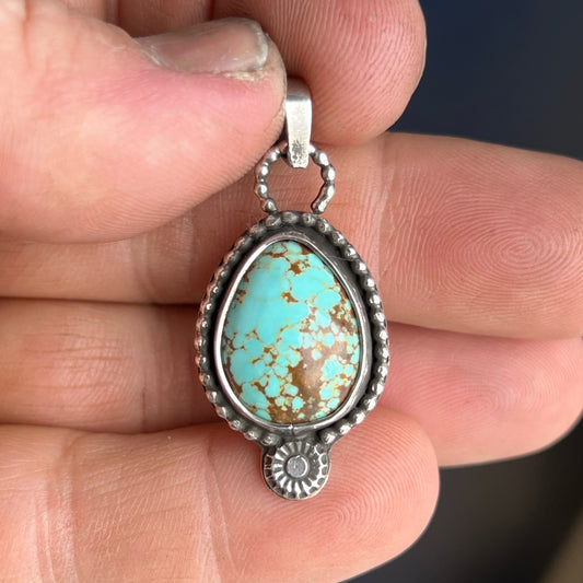 Number 8 Turquoise Cabochon in Sterling Silver Pendant