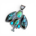 Polychrome Hubei Turquoise Moth Pendant in Sterling Silver